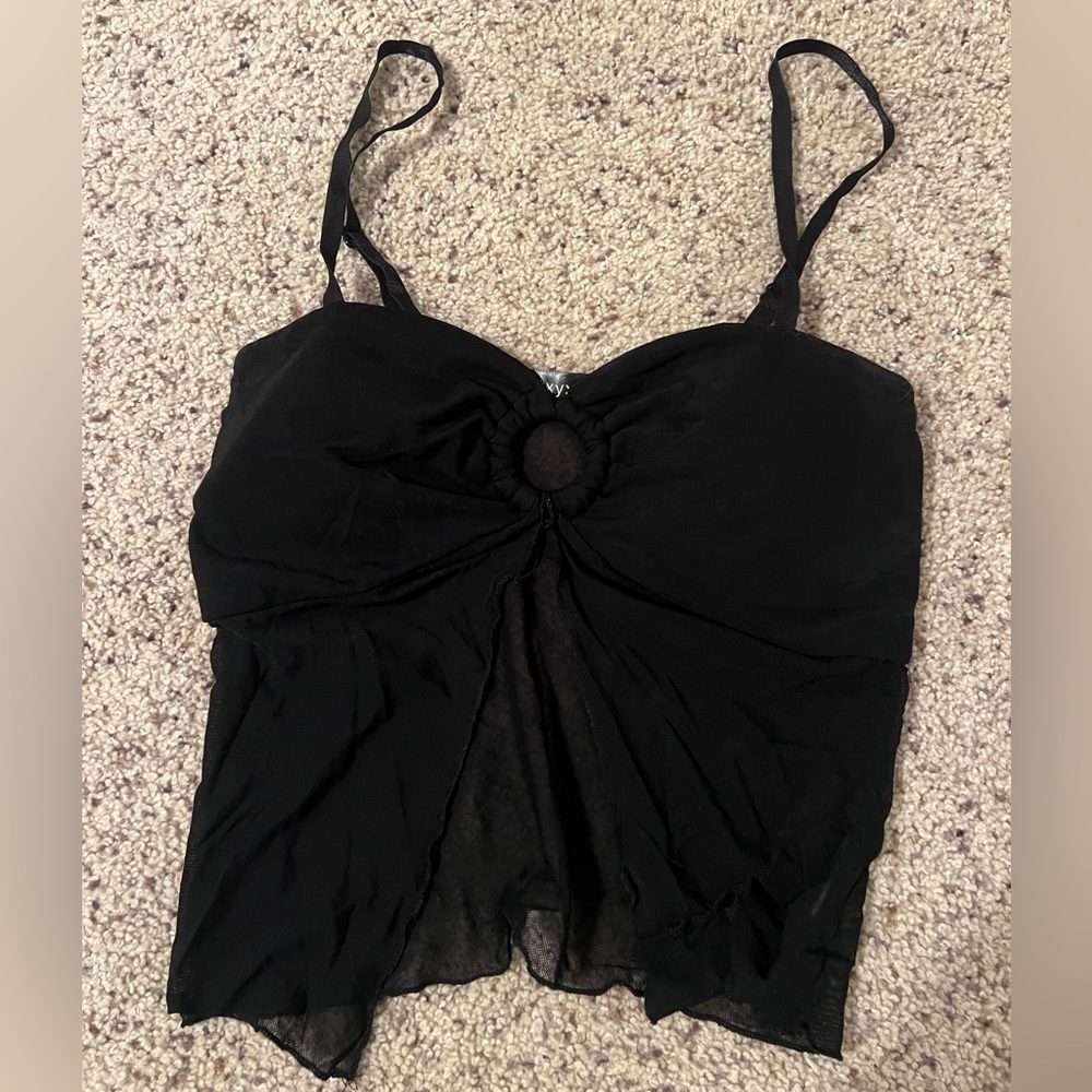 Black going out top